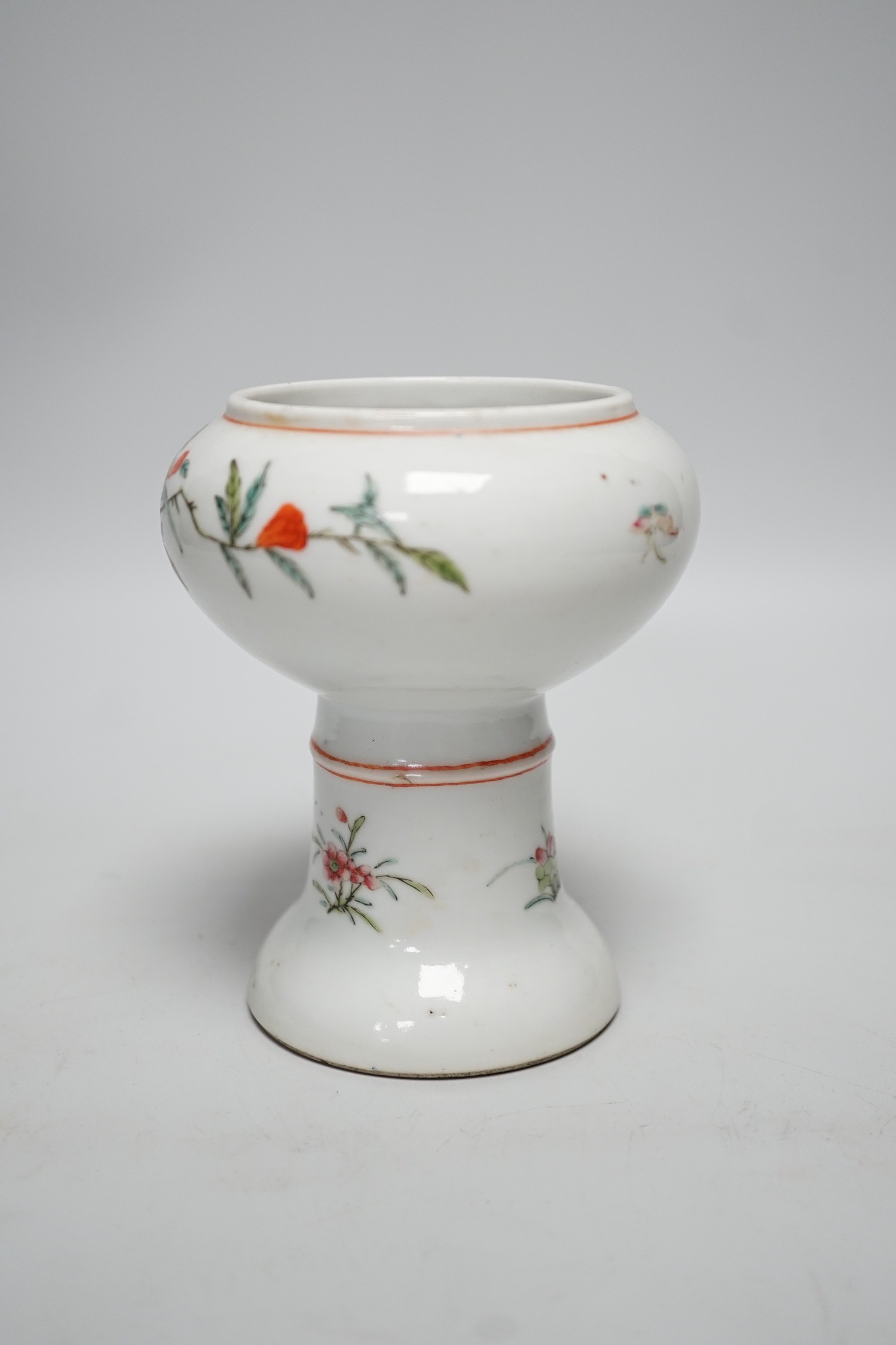 A 19th century Chinese stem cup, painted with flowers and fruit 12cm